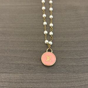 raw and rebellious louis vuitton charm necklace
